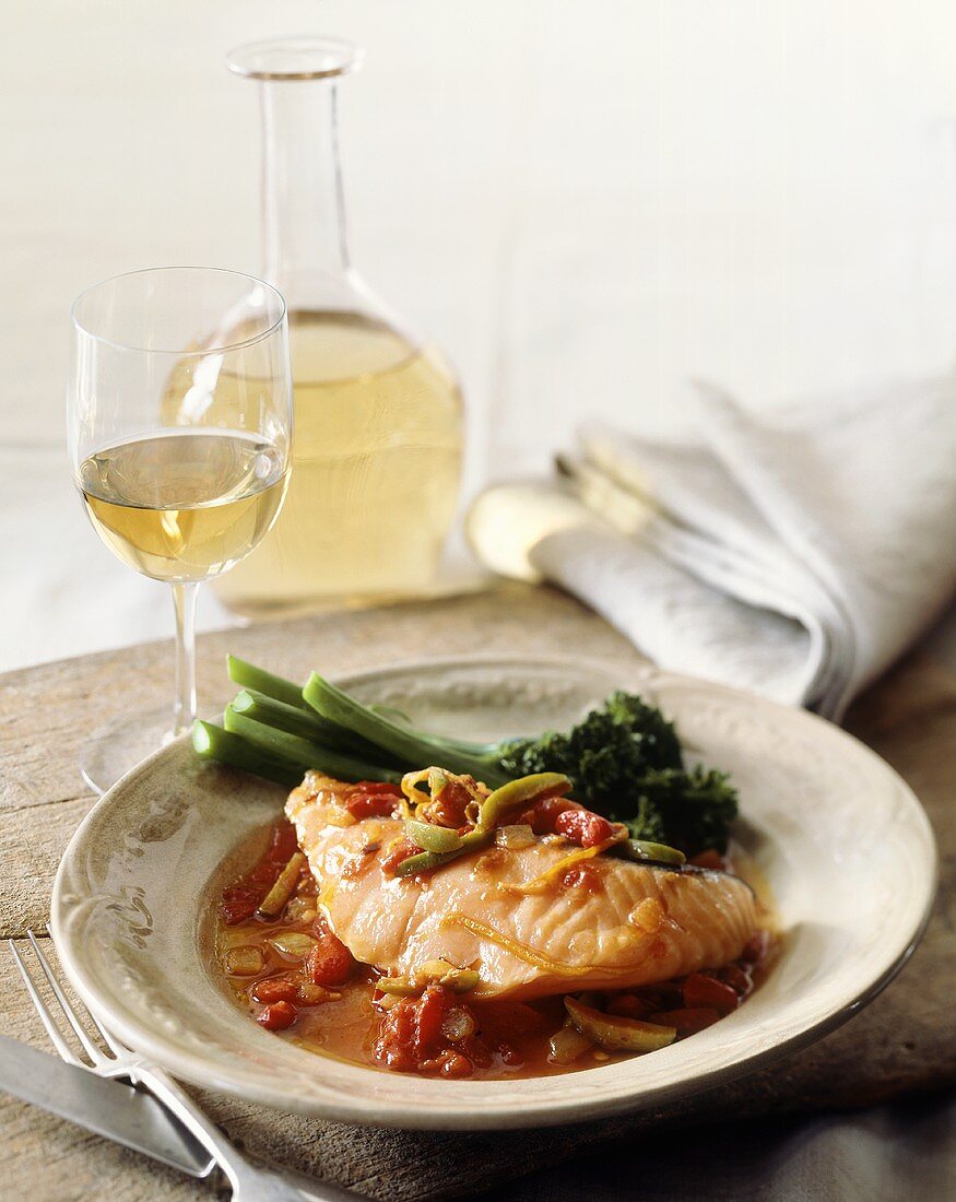 Salmon with tomato and olive sauce, white wine