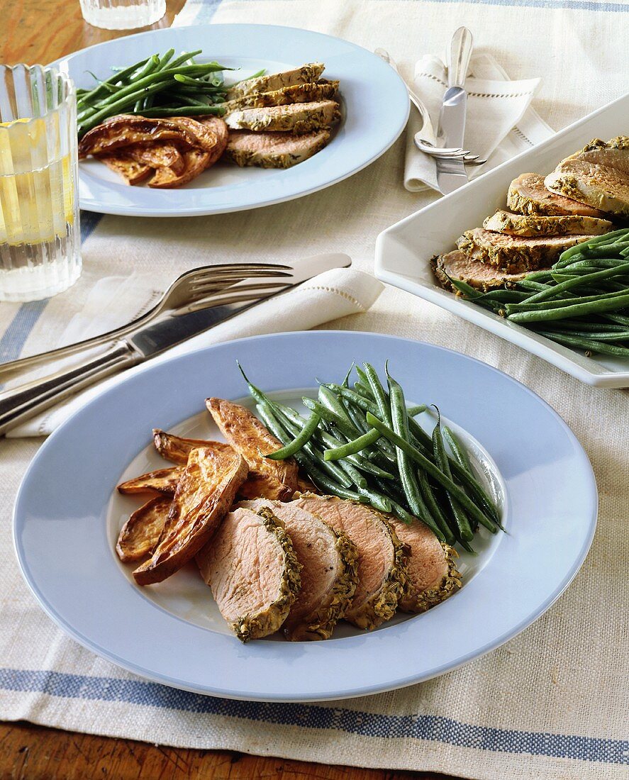 Pork fillet with caraway crust, green beans, sweet potatoes