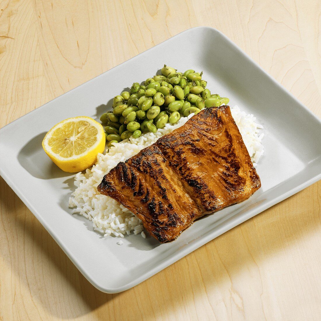 Salmon fillet with maple & soya glaze, rice and soya beans