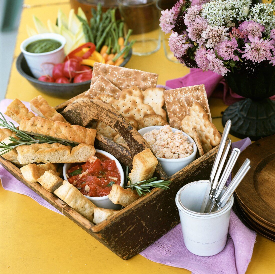 Focaccia with tomato dip and crackers with seafood dip