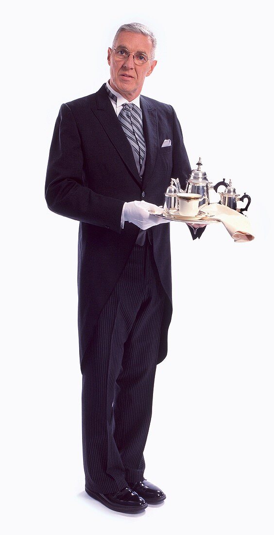 Butler Holding Silver Tray with Coffee Pot and Cup