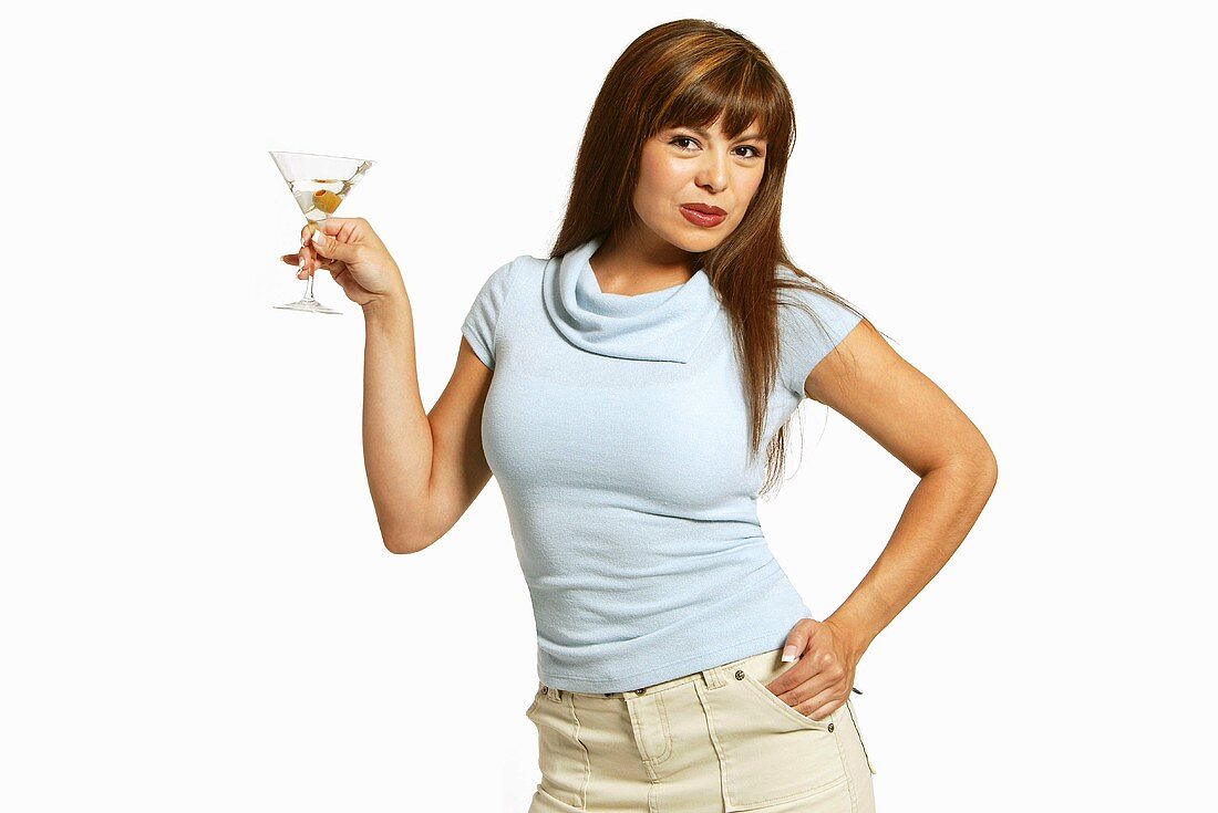 Woman Holding Martini on White with Hand on Hip