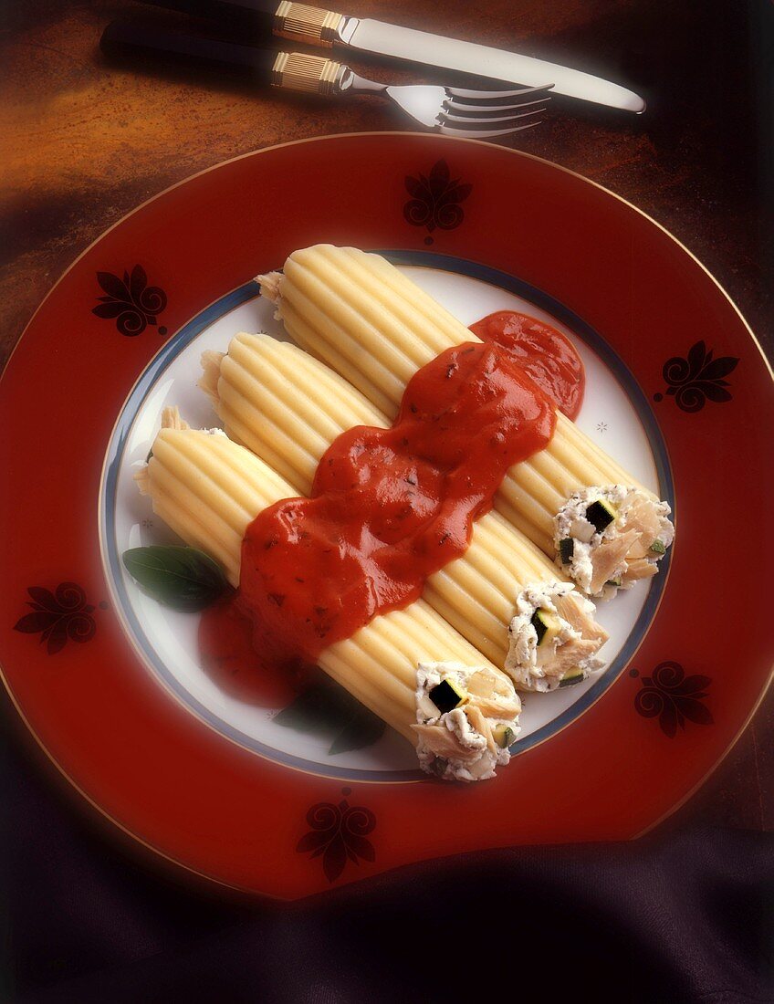 Stuffed manicotti with a marinara sauce