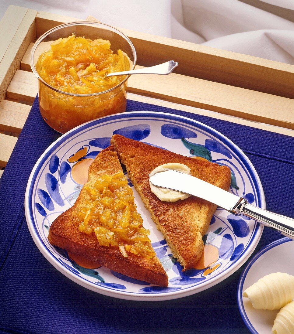 Breakfast Tray with Toast, Butter, Butter Knife, and Marmalade
