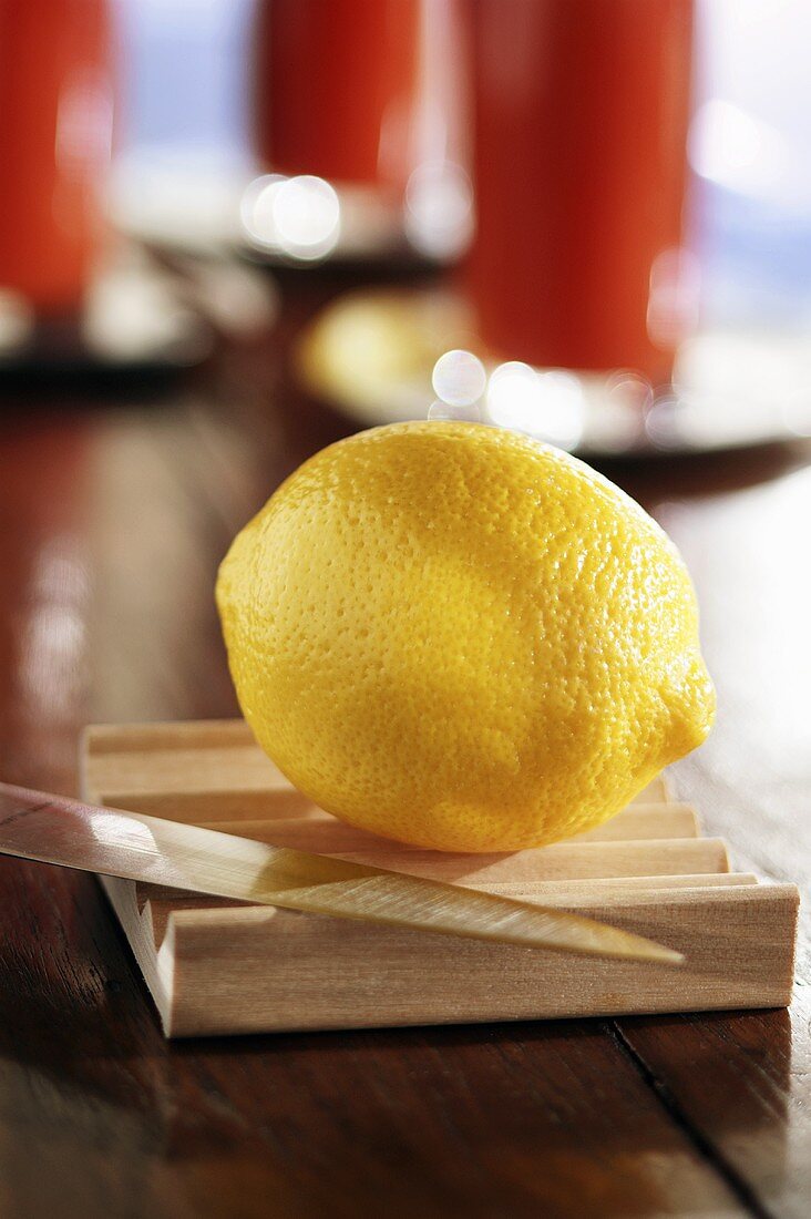 Whole lemon with knife