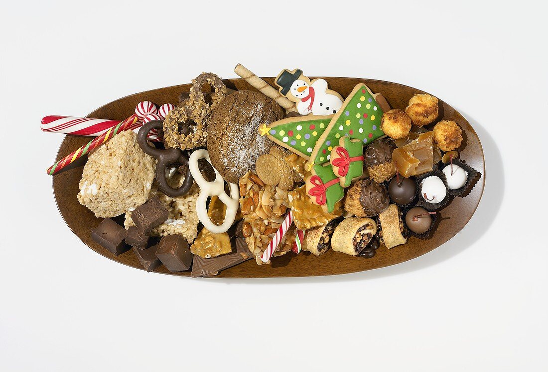 Christmas biscuits and sweets on oval plate