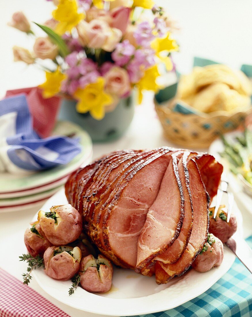 Spiral Cut Ham on a Platter with Roasted Red Potatoes