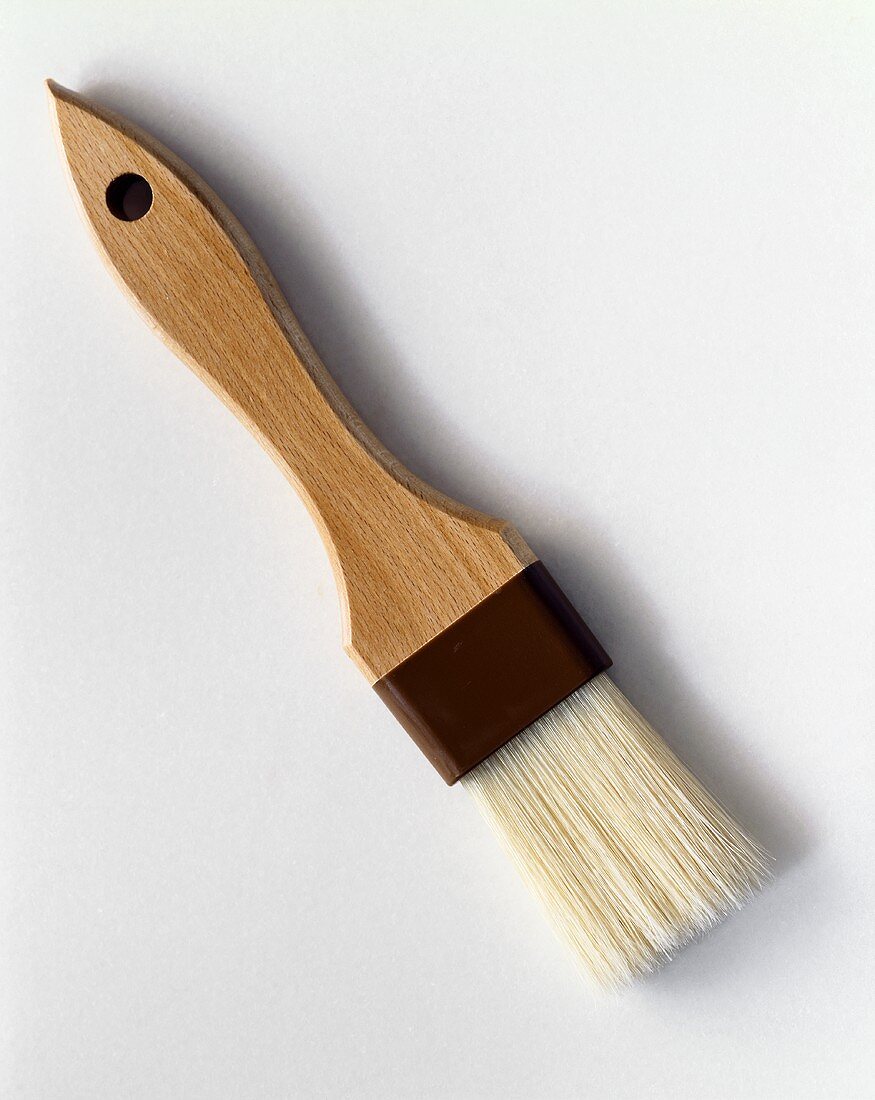 A Single Pastry Brush on a White Background
