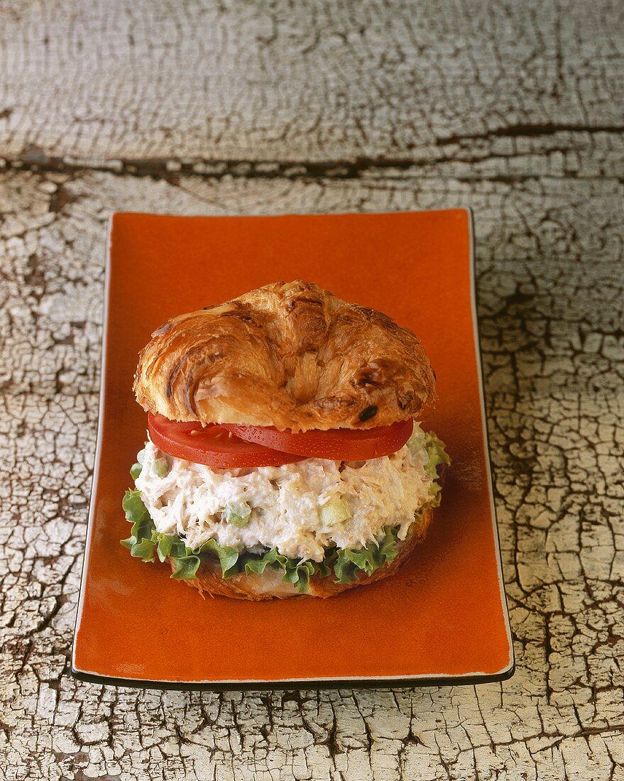 Chicken Salad Sandwich on a Croissant with Lettuce and Tomato