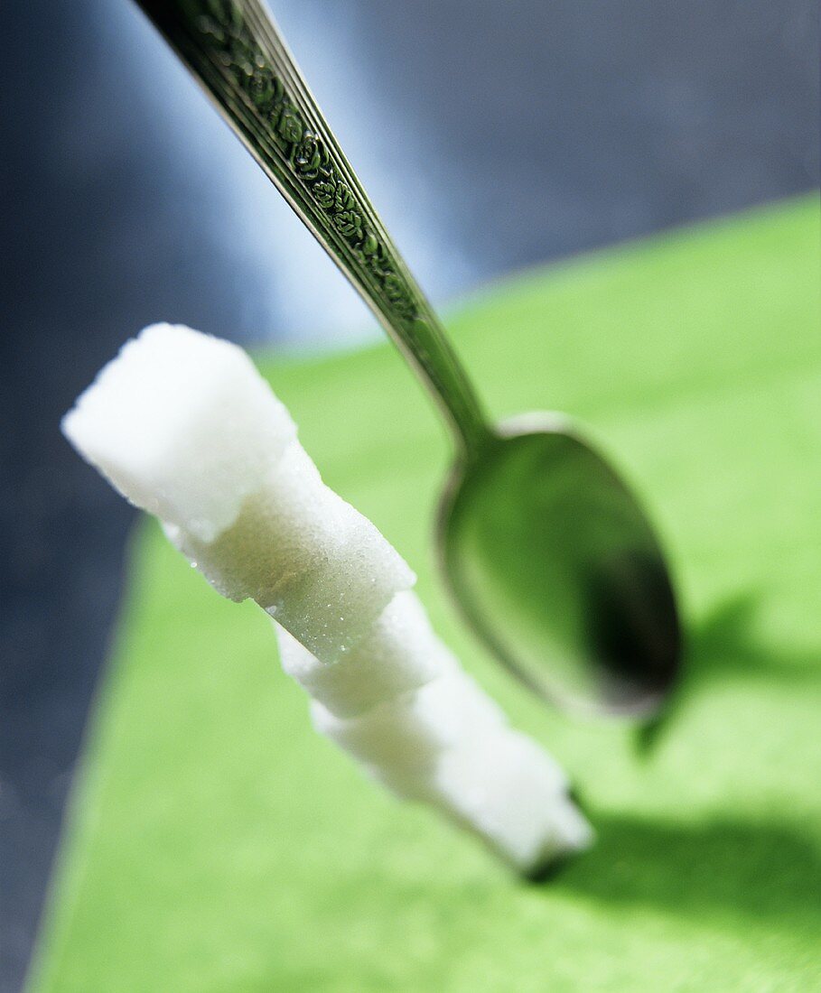 Tall Stack of Sugar Cubes; Spoon 