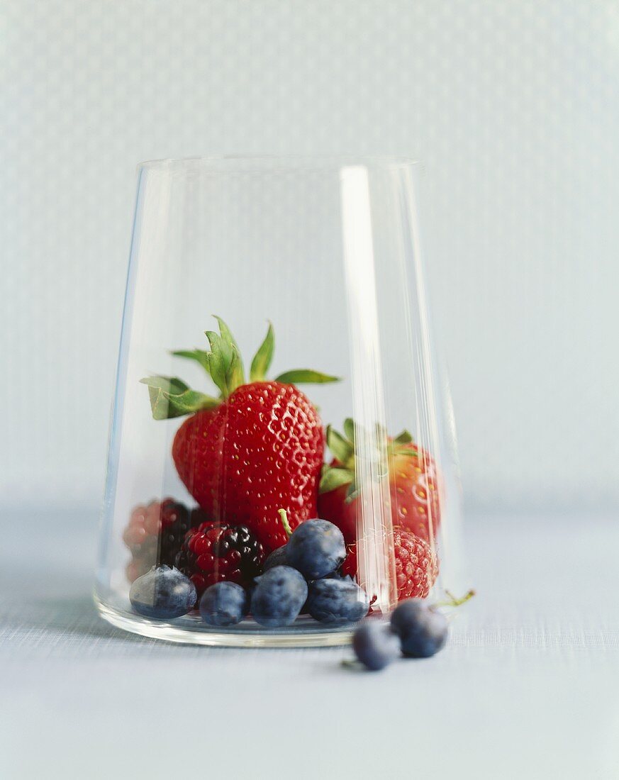 Various berries in a glass