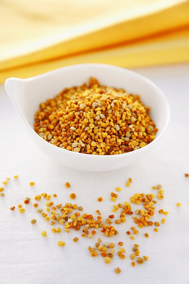 Bee Pollen Granules in a White Bowl