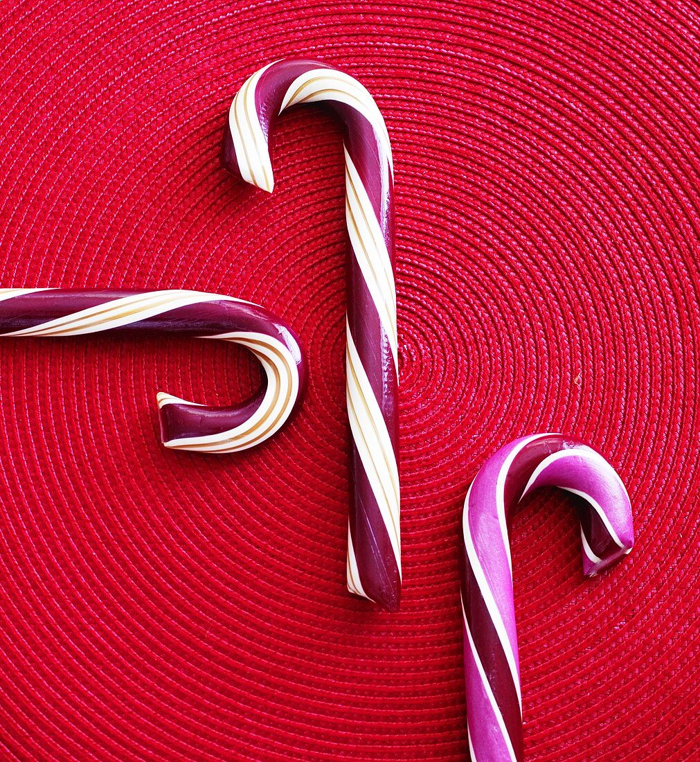 Three Candy Canes on Red
