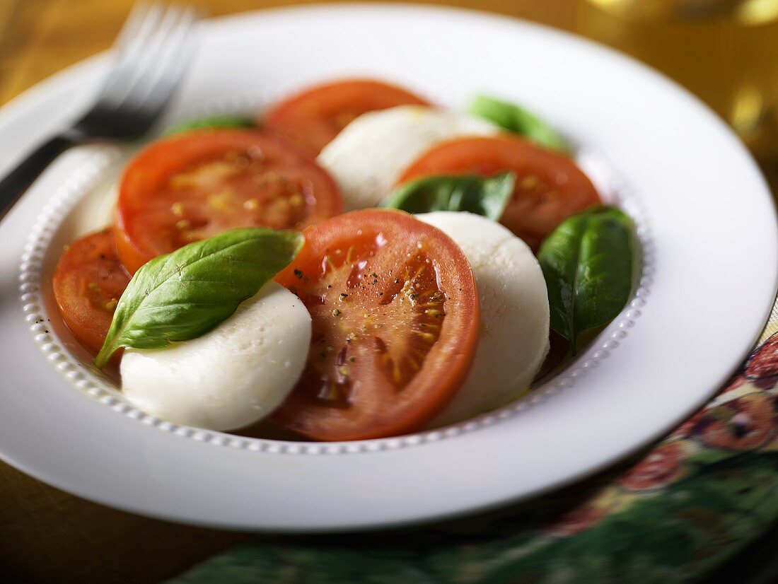 Tomatoes with mozzarella and basil