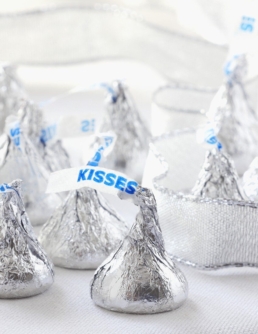 Group of Chocolate Kisses and Silver Ribbon