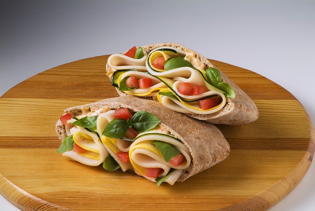 Turkey and Cheese Pita Sandwich with Tomato and Basil