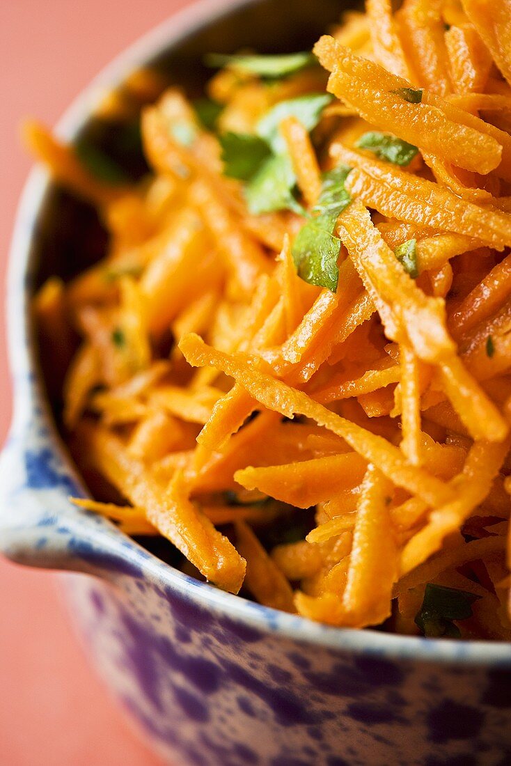 Bowl of Shredded Carrot; Close Up