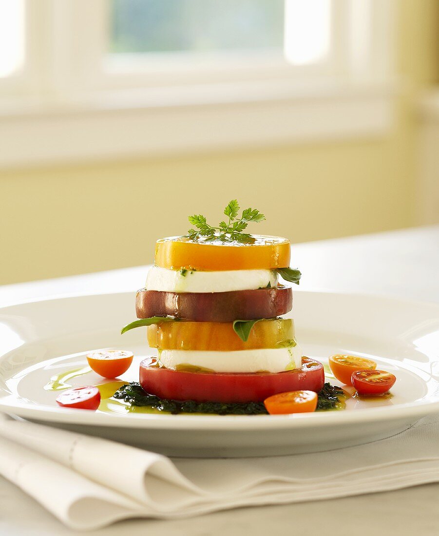 Stacked Heirloom Tomato Salad with Mozzarella Cheese and Pesto