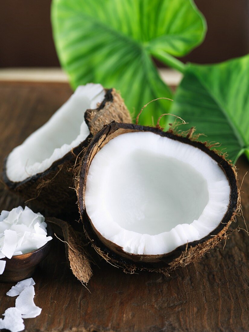 Coconut Broken Open; Dehydrated Coconut in a Bowl