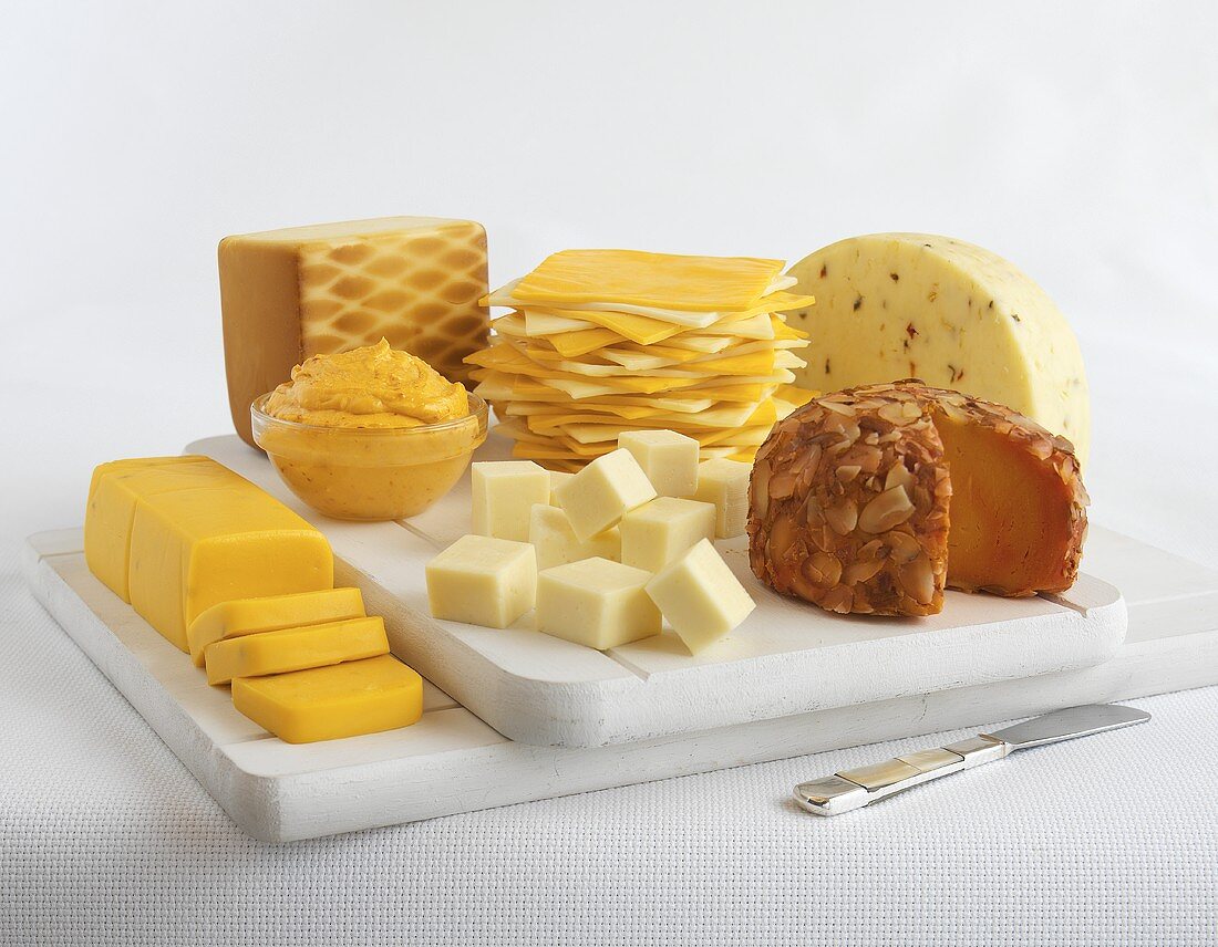 Various Processed Cheeses on Boards