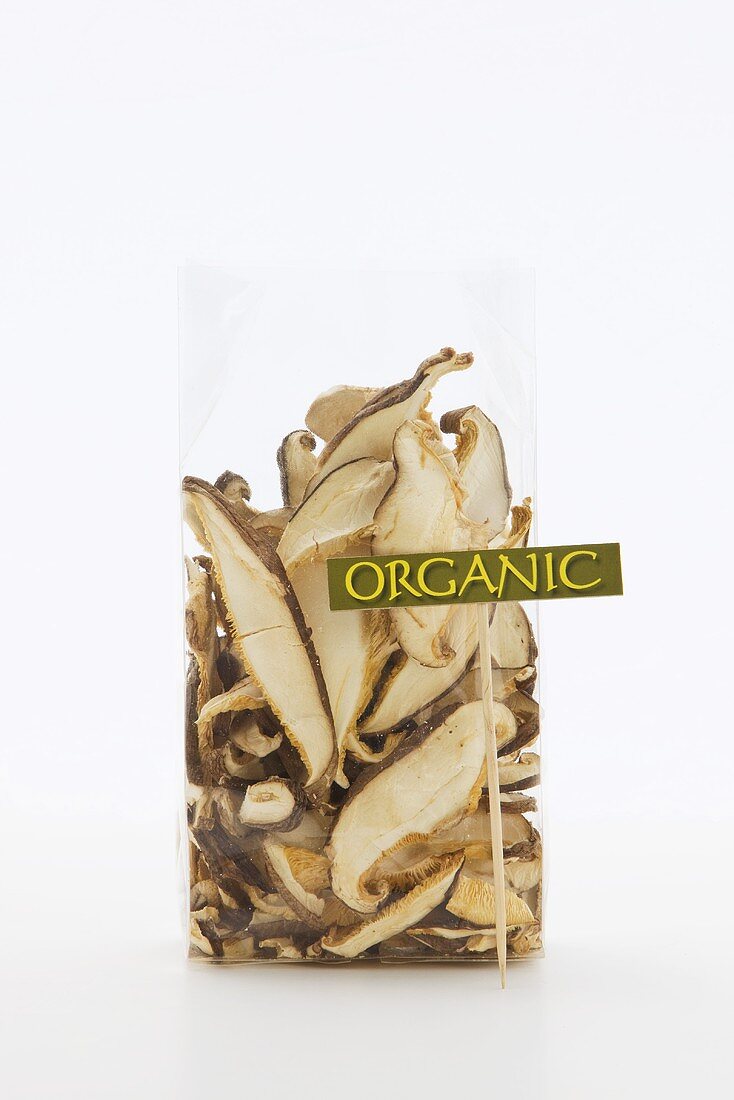 Sliced Dried Organic Shiitake Mushrooms in a Container; Sign