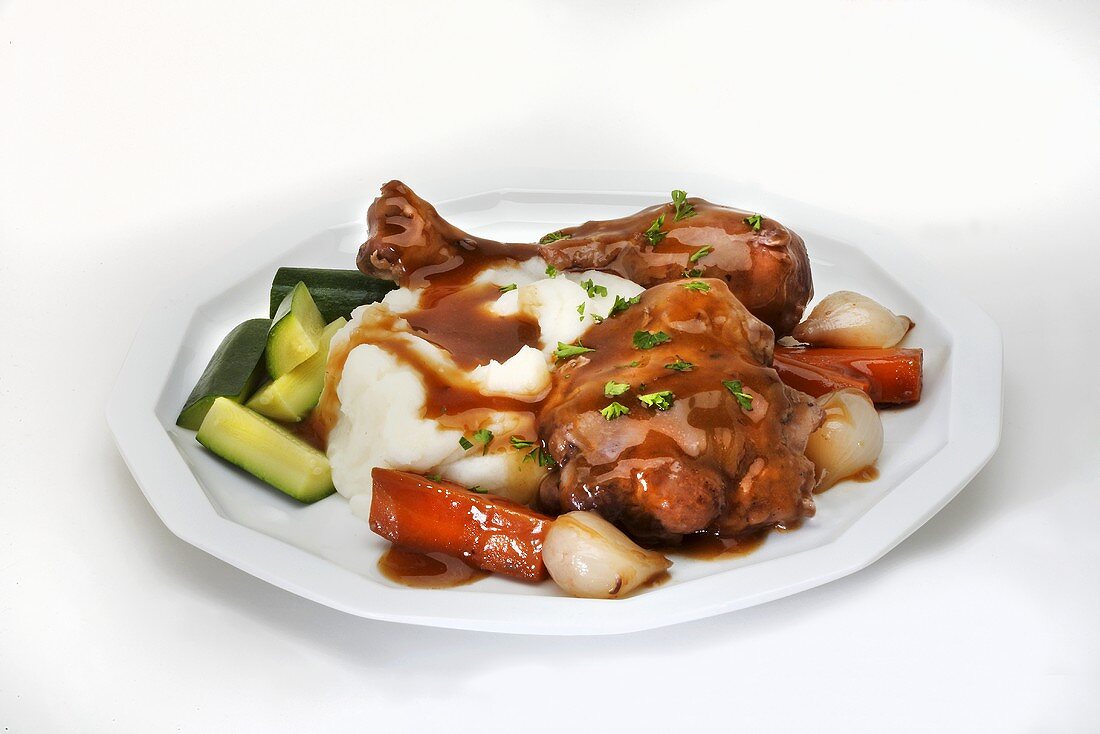 Coq au Vin with Mashed Potatoes; On a White Plate