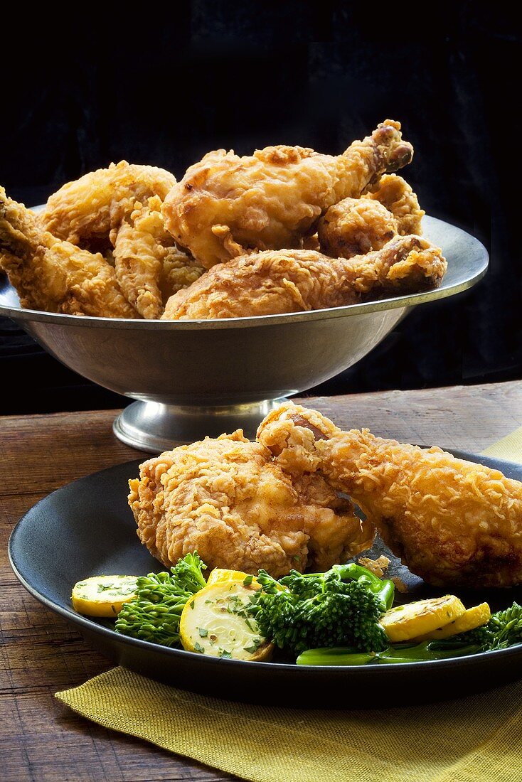 Plate of Fried Chicken with Veggies; Bowl of Fried Chicken