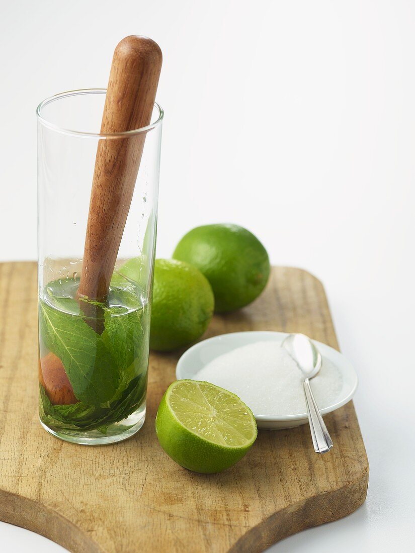 Preparing a Mojito; Crushing Mint in Glass