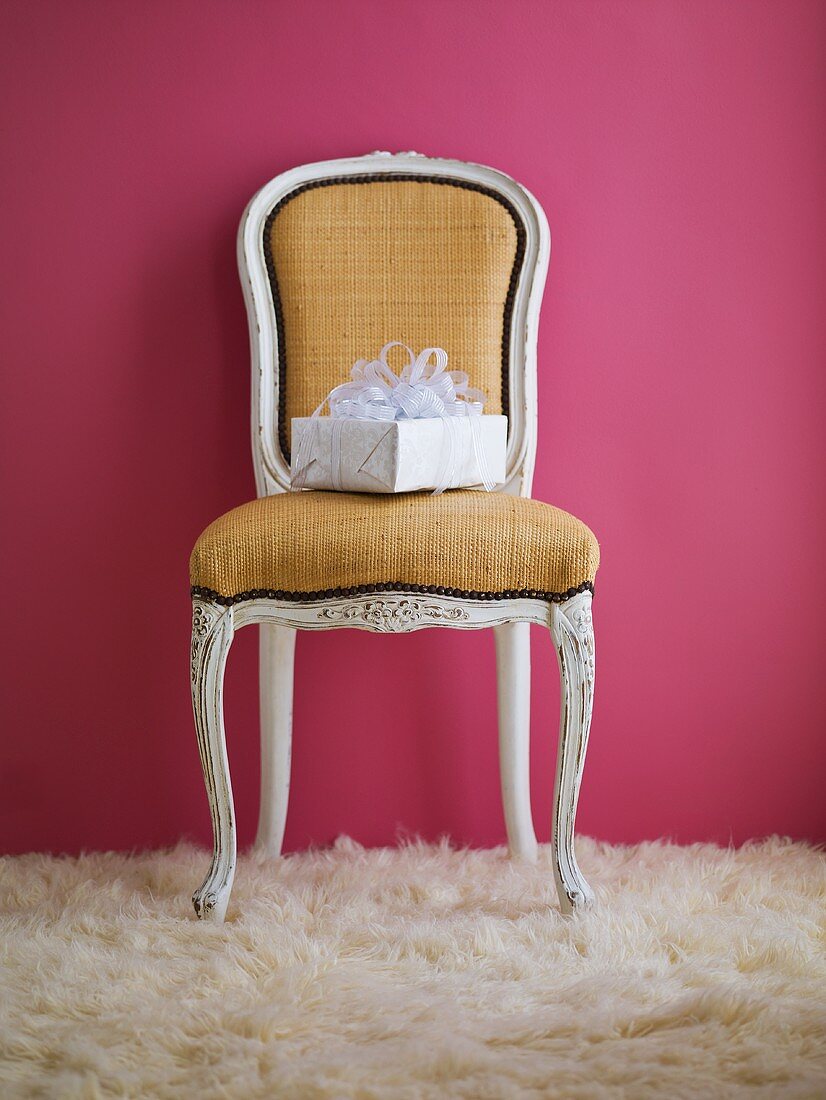 Elegantly Wrapped Gift on a Chair