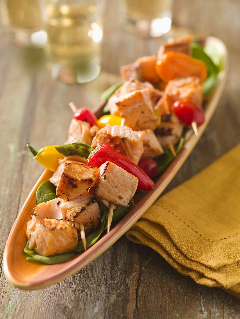 Salmon, Pepper and Asparagus Kabobs; Glasses of White Wine