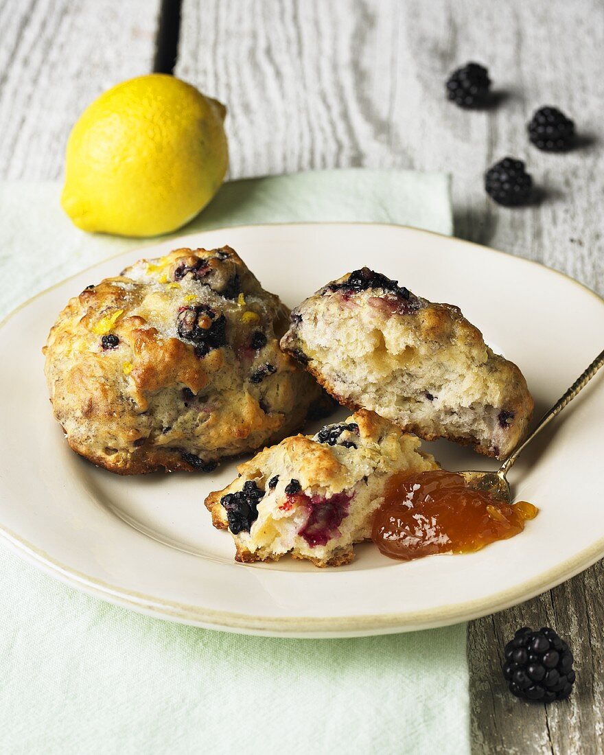 Blackberry and Lemon Scones on a Plate with Spoonful of Jam