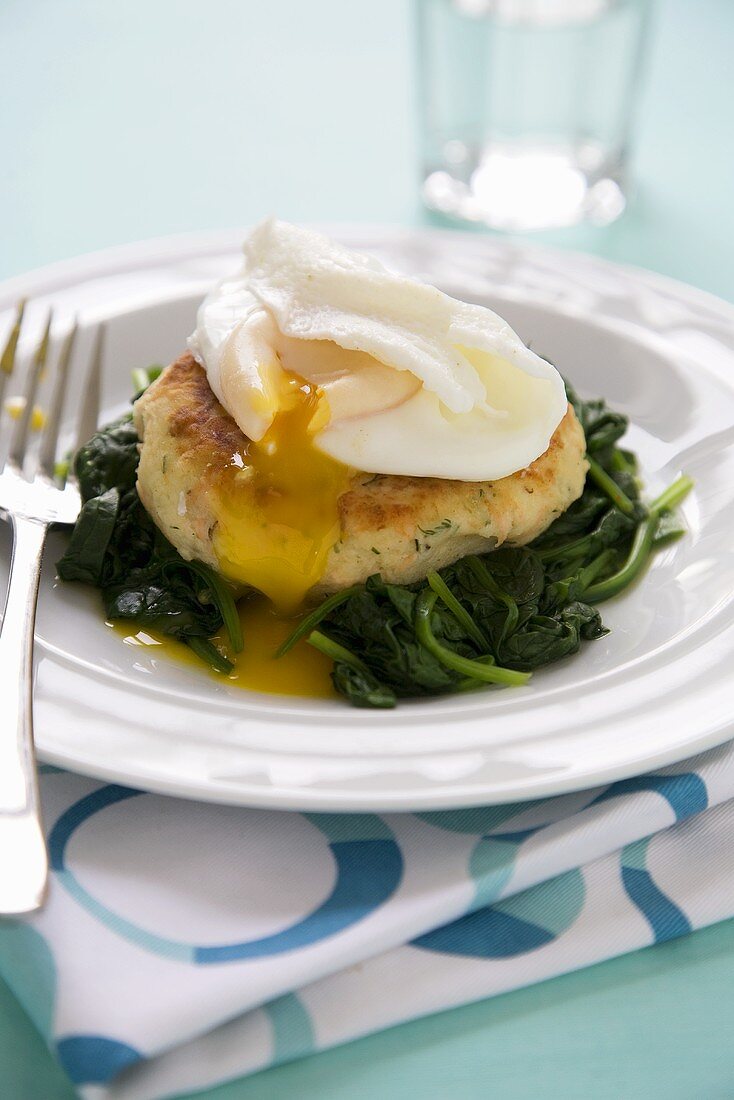 Salmon Fishcake on Wilted Spinach Topped with Poached Egg