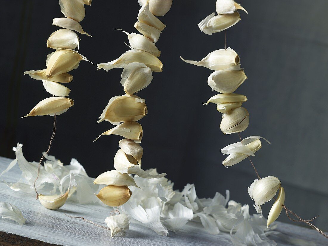 Three Hanging Strings of Garlic Cloves