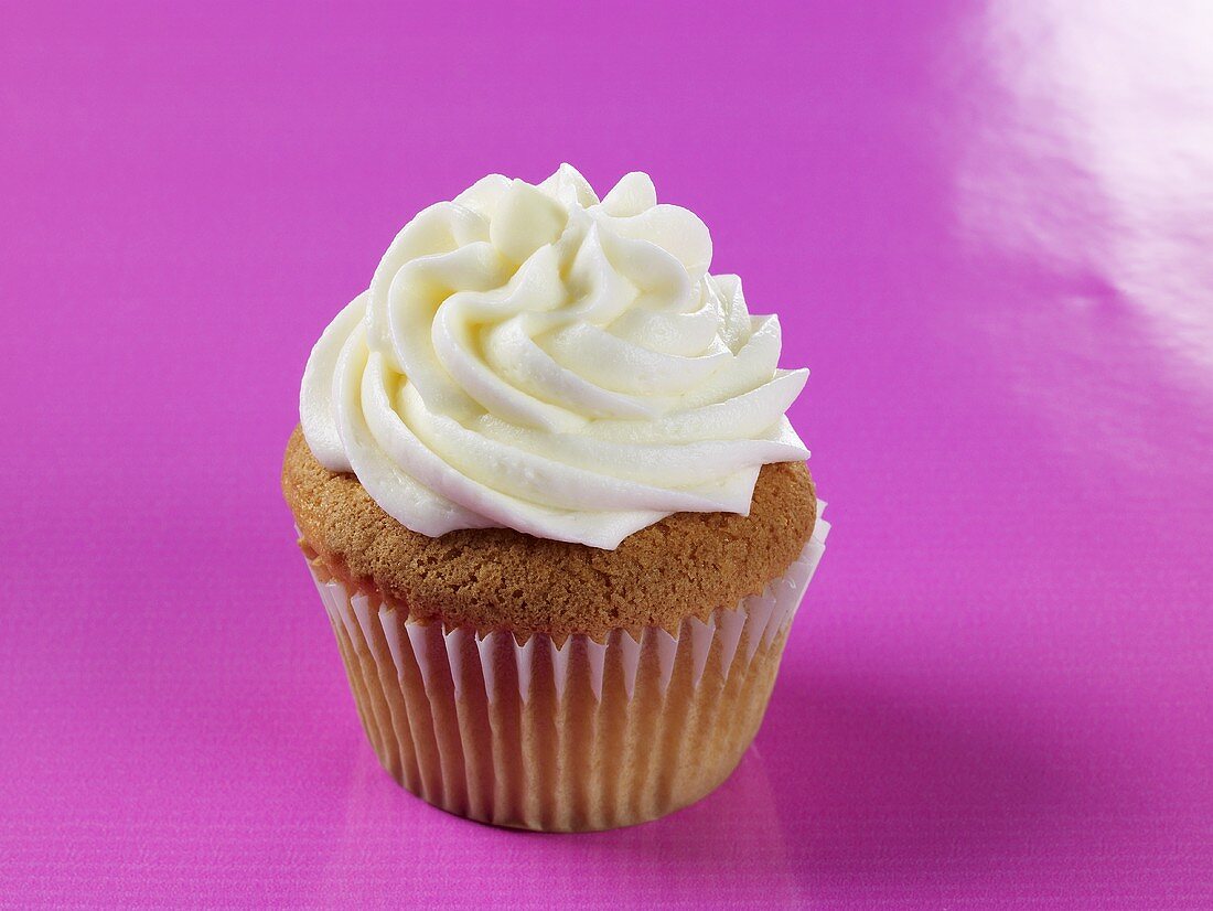 Vanilla Cupcake with Vanilla Frosting; On Purple