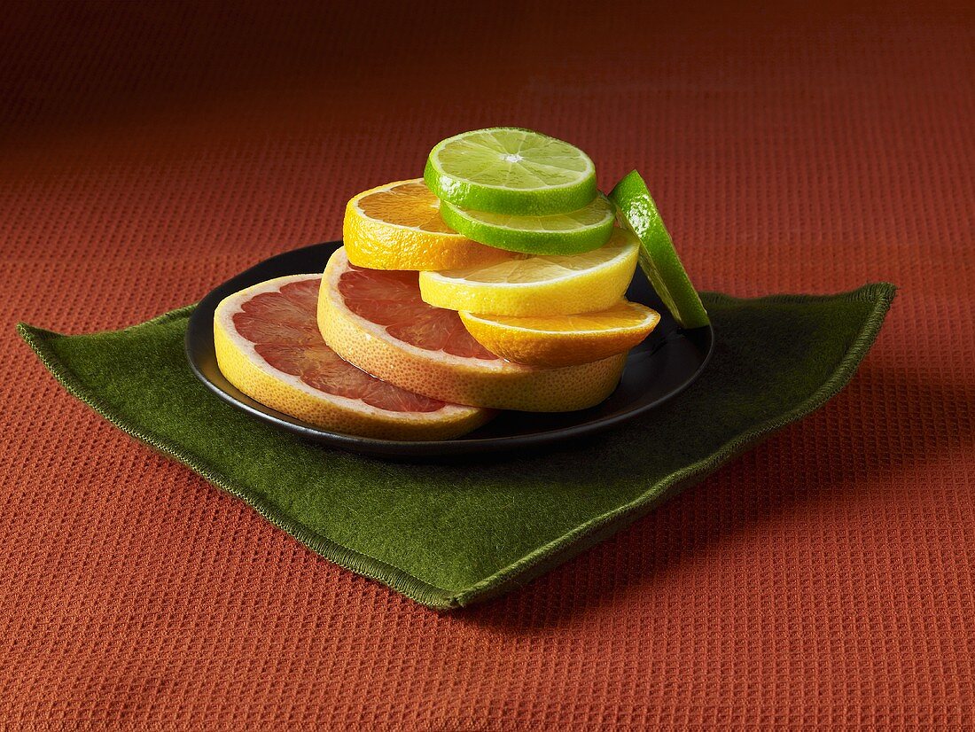 Slices of citrus fruits stacked