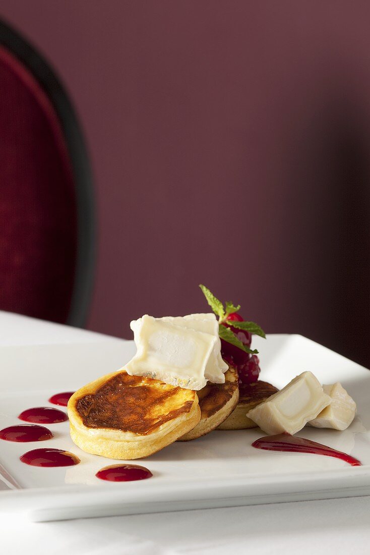 Ricotta pancakes with goats' cheese and raspberry sauce