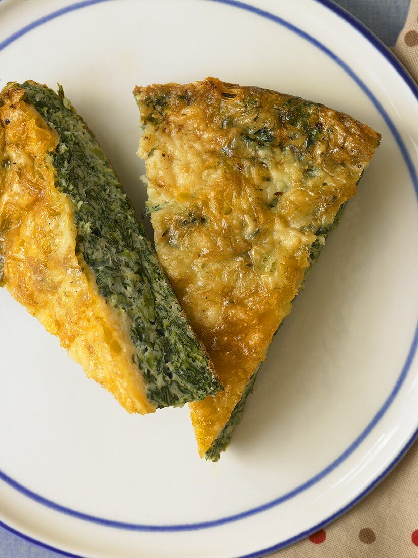 Two Slices of Spinach Frittata on a Plate