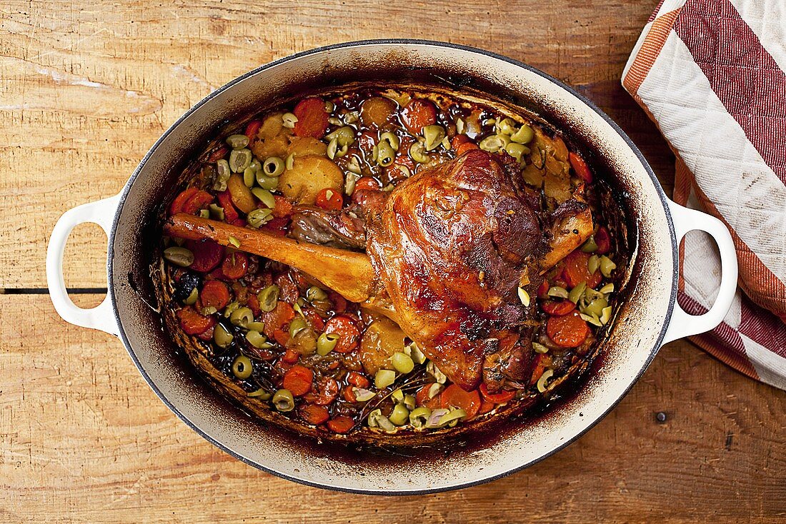 Leg of Lamb and Chopped Vegetables in a Roasting Pan