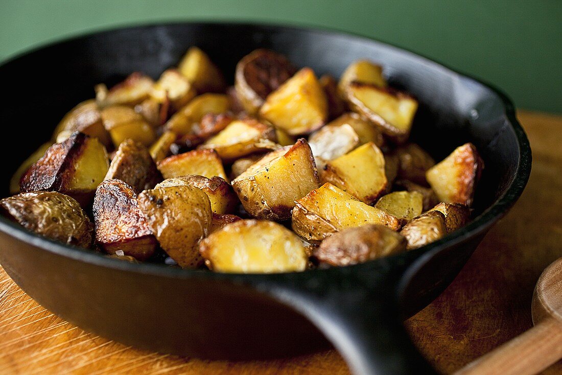 Cinnamon Roasted Potatoes in a Cast Iron Skillet