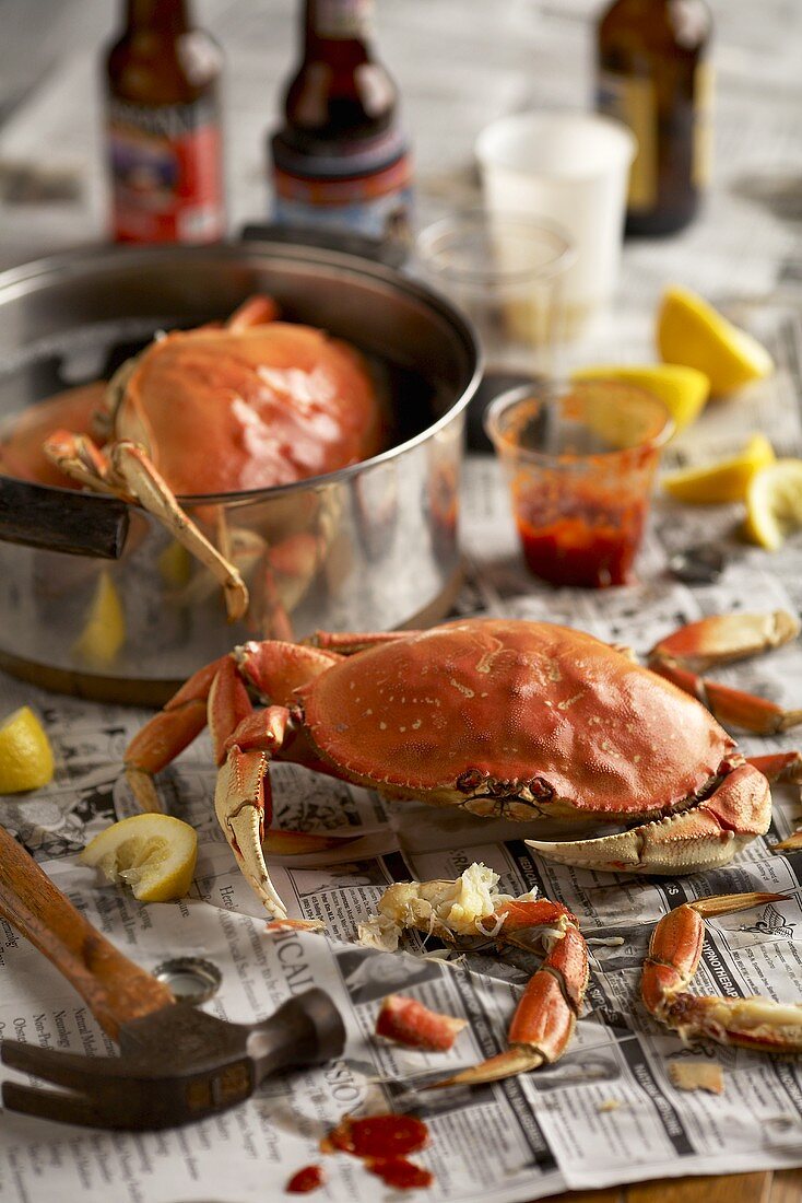 Steamed Crabs Eaten on Newspaper with Condiments