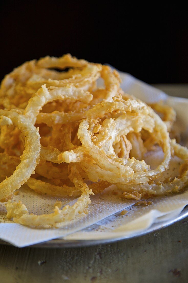 Onion Rings on a Napkin Lined Plate