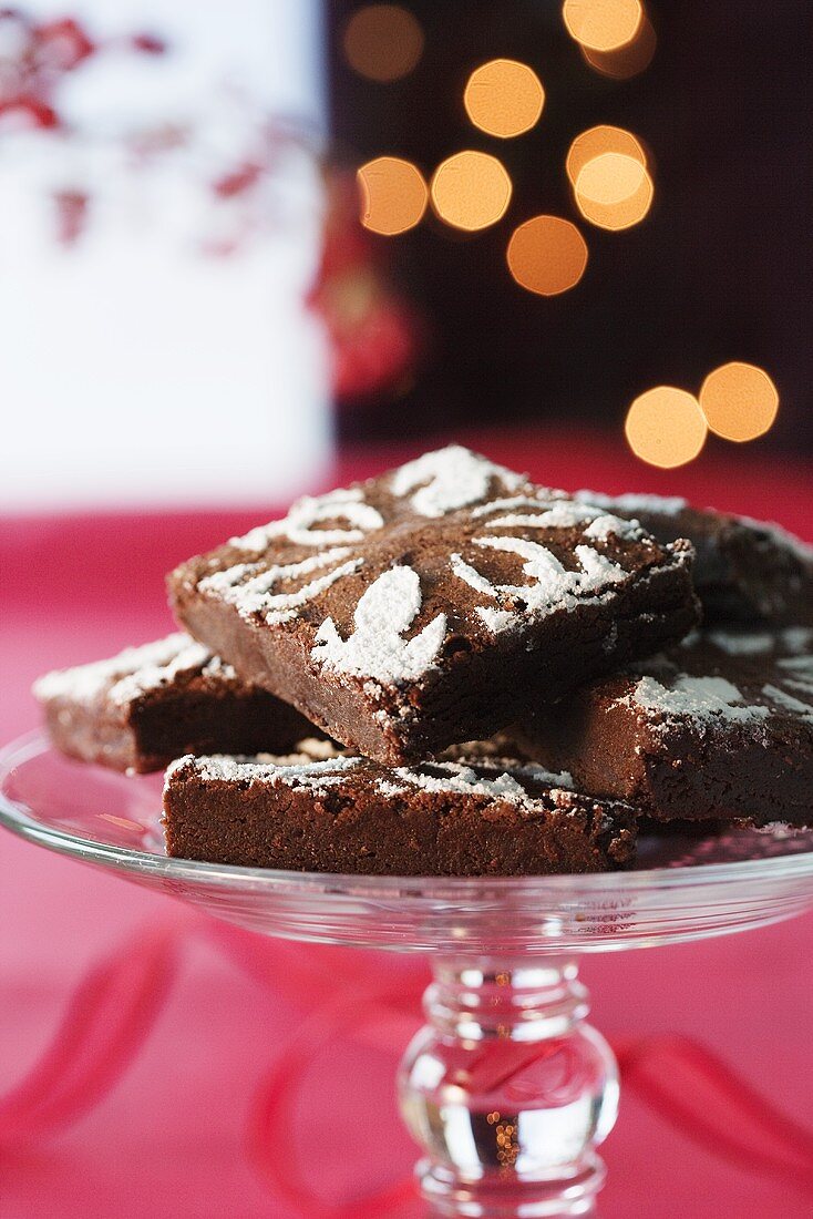 Fudgey Chocolate Brownies with Powdered Sugar on Pedestal Dish