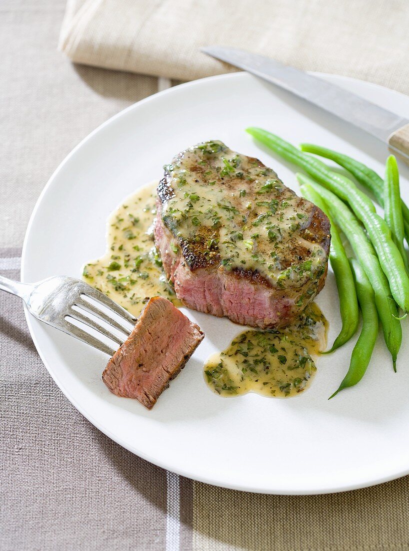 Steak deBurgo; Steak Topped with Butter, Herbs and Garlic; Served with Green Beans