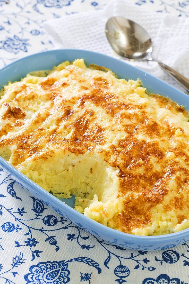 Chantilly Potatoes in a Baking Dish; Scoop Removed