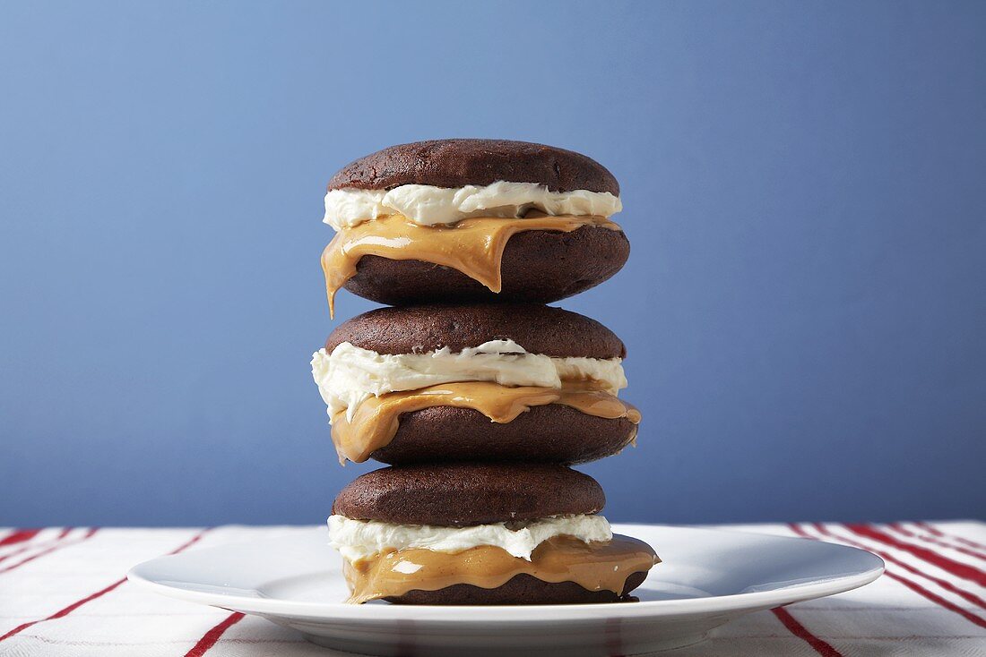 Peanut Butter Whoopie Pies Stacked on a Plate