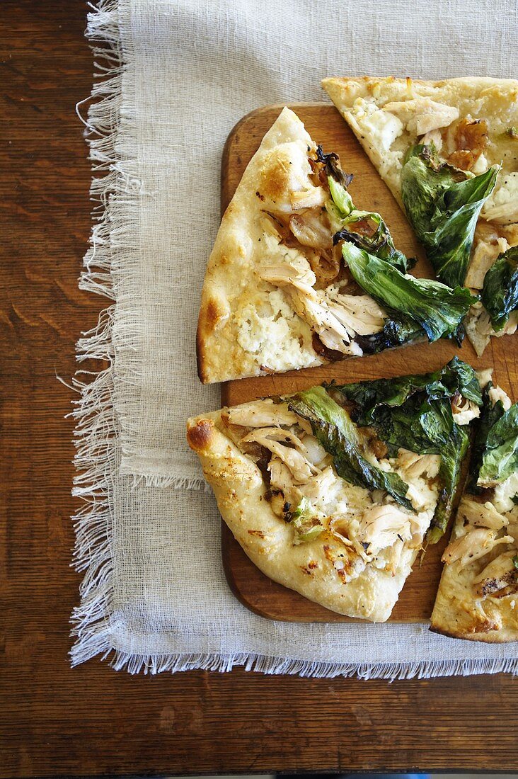 Chicken and Escarole Pizza with Goat Cheese; Slices on Board