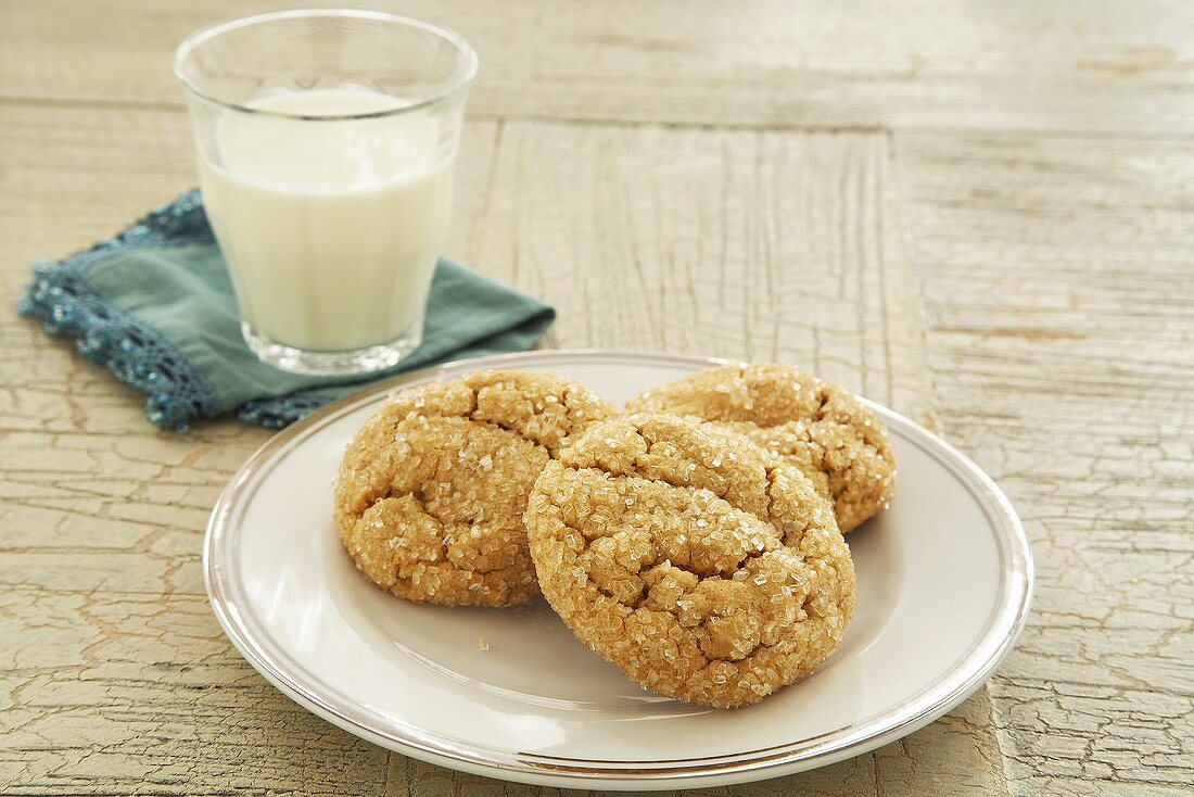 Three Snickerdoodles on a Plate with a Glass of Milk