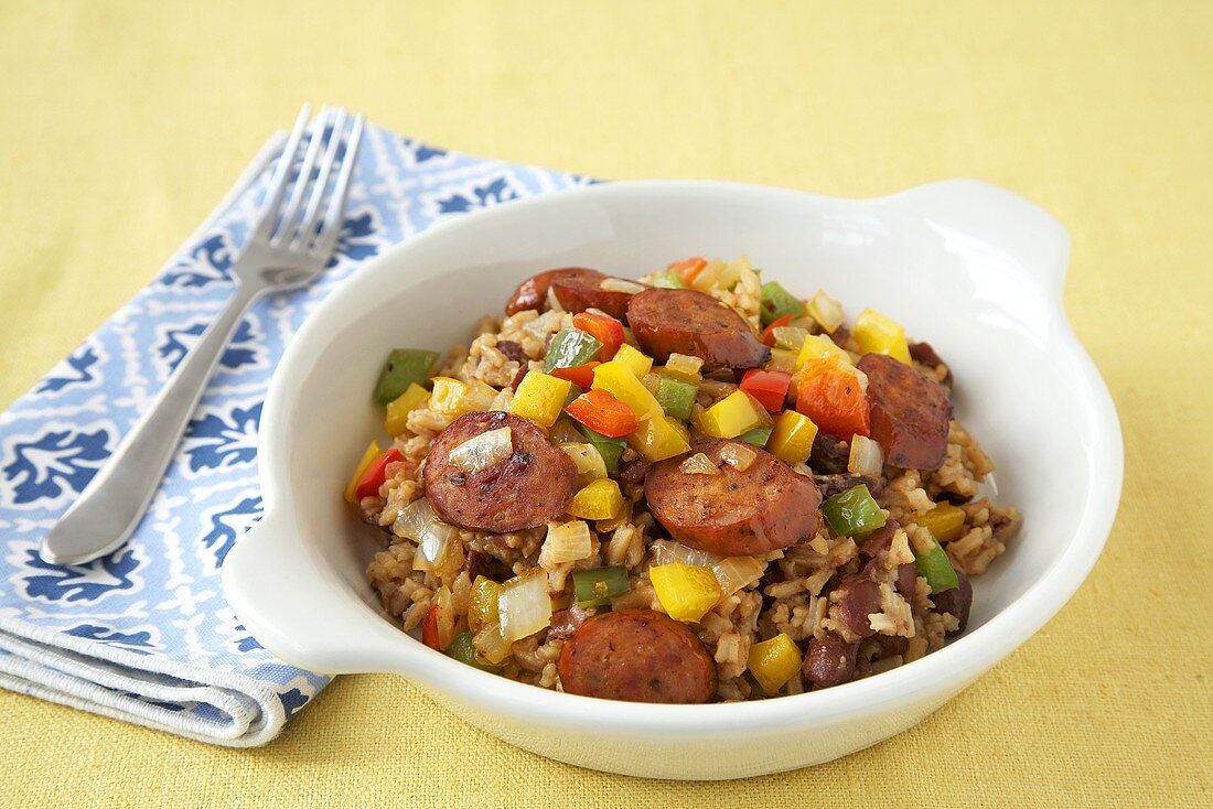 Cajun Sausage and Peppers with Rice in a White Bowl