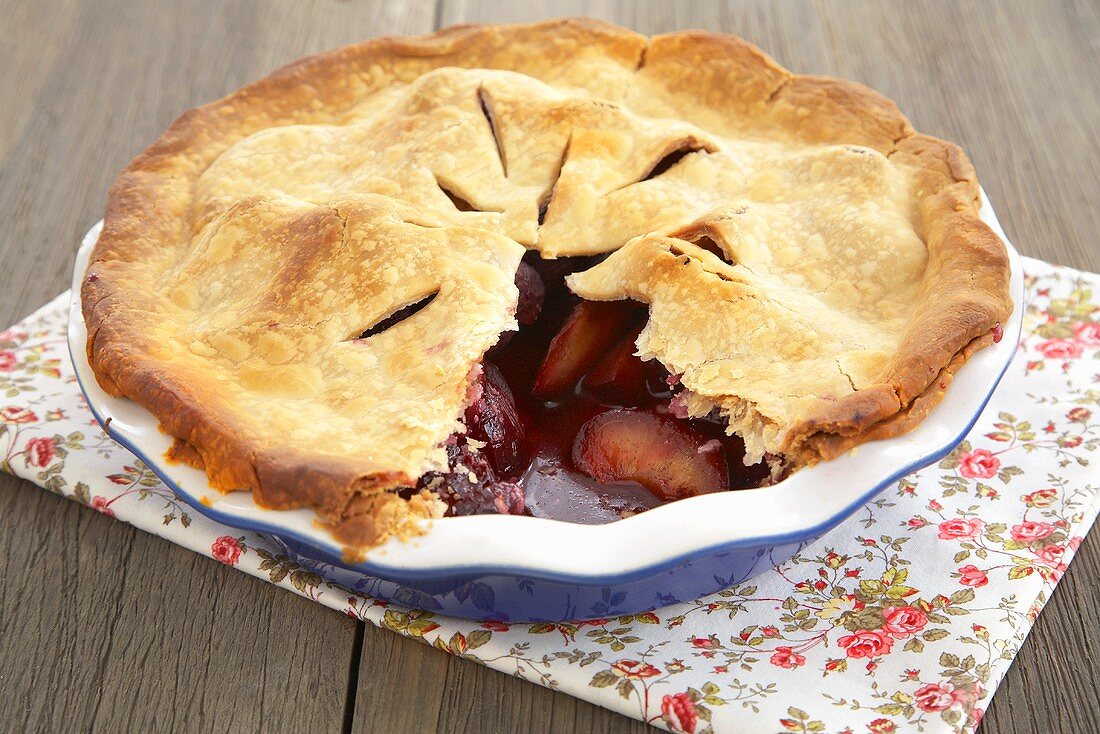 Plum Pie with Slice Removed