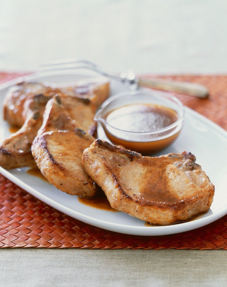 Platter of Pork Chops with Cider Sauce